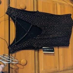 Glittery tank with criss cross back